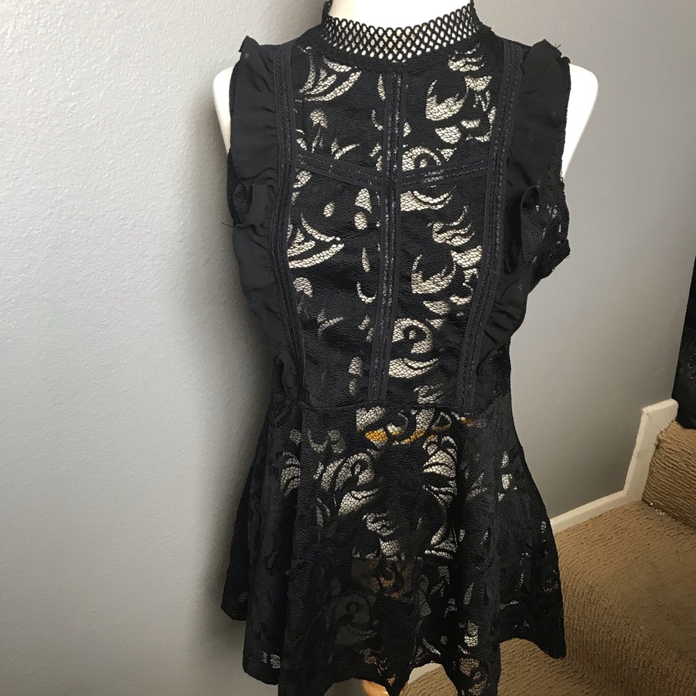 Sexy black lace top. Keyhole back closure.